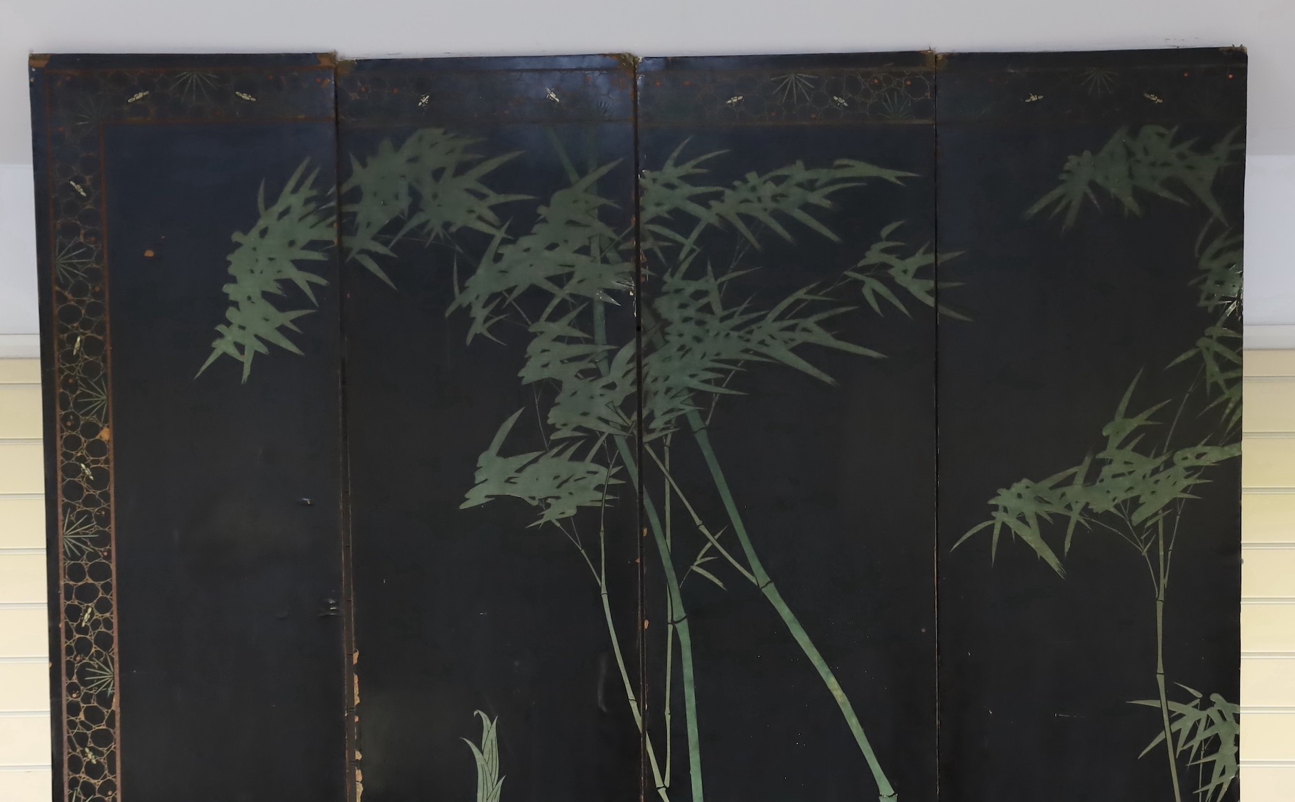 A tall Chinese coromandel lacquer twelve panel screen, 19th century, each leaf panel width 49cm, height 264cm